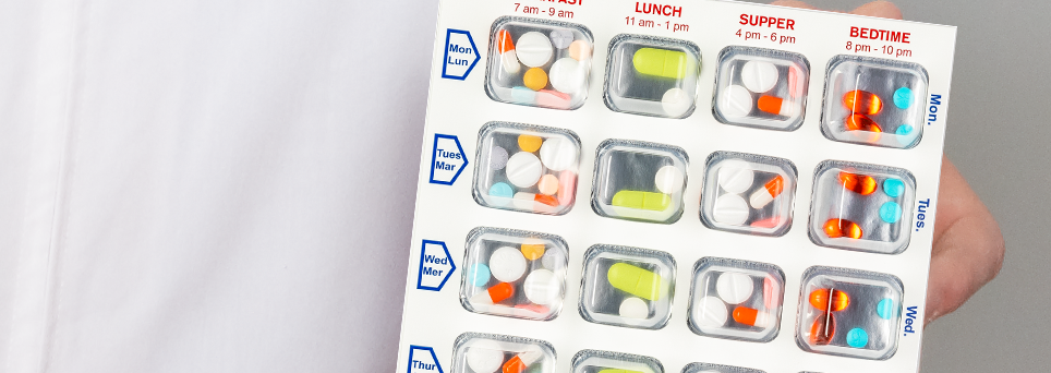 close-up of hand held compliance packaging